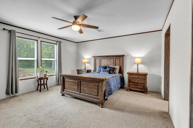 25386 Patterson Rd, Tecumseh, OK 74873 - bedroom featuring light colored carpet, ornamental molding, and a ceiling fan