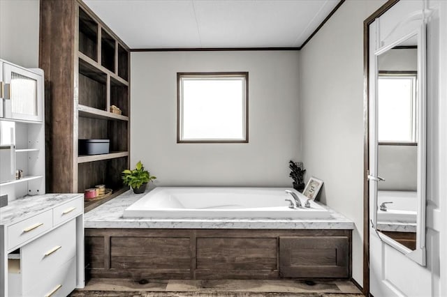 25386 Patterson Rd, Tecumseh, OK 74873 - full bathroom featuring healthy amount of natural light, a garden tub, and crown molding