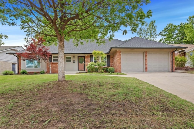 single story home with roof with shingles, a front lawn, brick siding, a garage, and driveway
