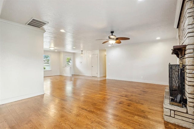 unfurnished living room with a ceiling fan, baseboards, visible vents, and recessed lighting