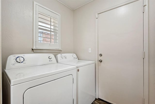 laundry area featuring laundry area and washer and dryer
