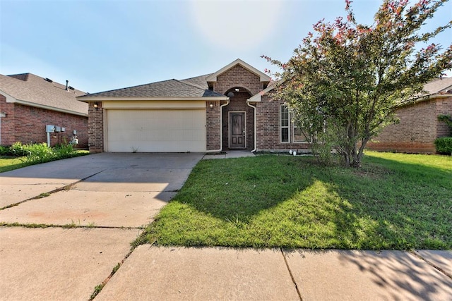 single story home featuring a garage, brick siding, driveway, and a front yard