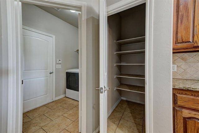 pantry featuring washer / dryer