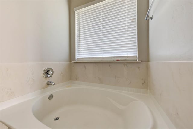full bath featuring a garden tub