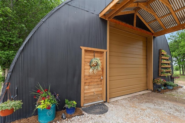 view of outdoor structure with driveway