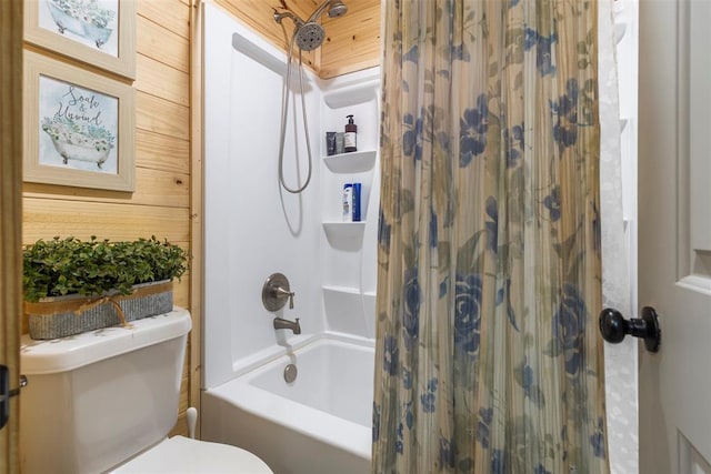 full bathroom with shower / bathtub combination with curtain and toilet