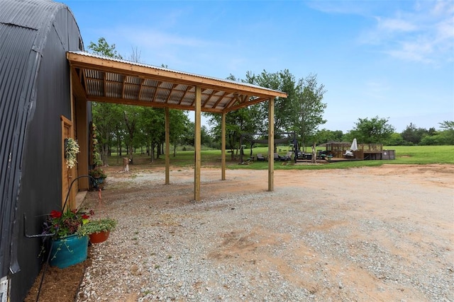 view of patio / terrace with a carport