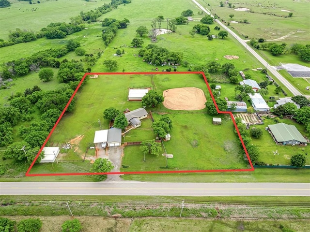 birds eye view of property featuring a rural view