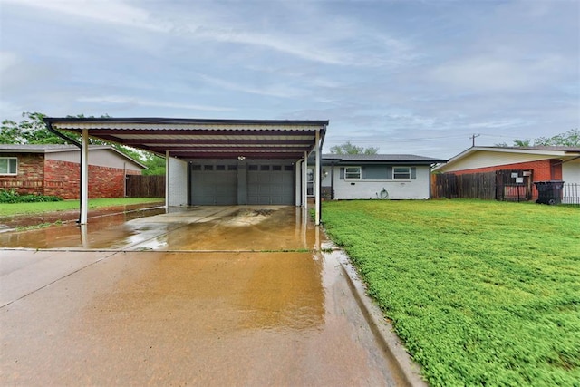 single story home featuring brick siding, fence, driveway, and a front yard