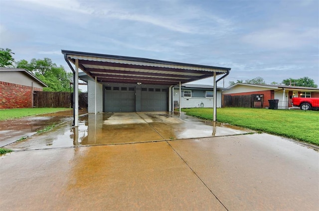 exterior space featuring fence and driveway