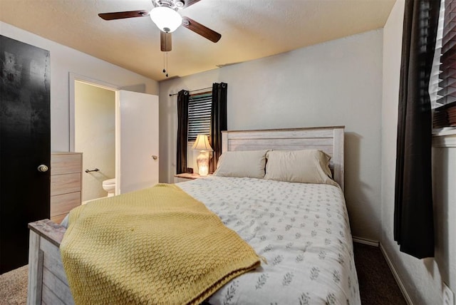 carpeted bedroom with baseboards and ceiling fan