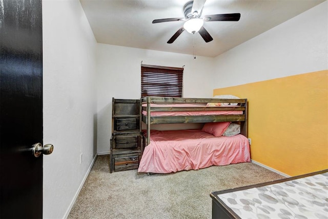 bedroom featuring baseboards, carpet, and ceiling fan
