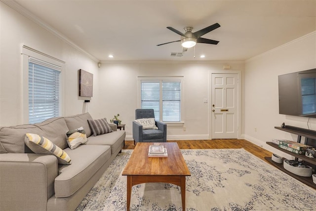 living room featuring crown molding, ceiling fan, recessed lighting, wood finished floors, and visible vents