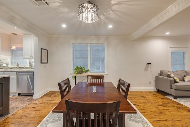 dining room featuring recessed lighting, baseboards, light wood-type flooring, and visible vents
