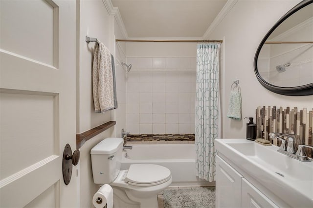 bathroom featuring vanity, toilet, ornamental molding, and shower / tub combo