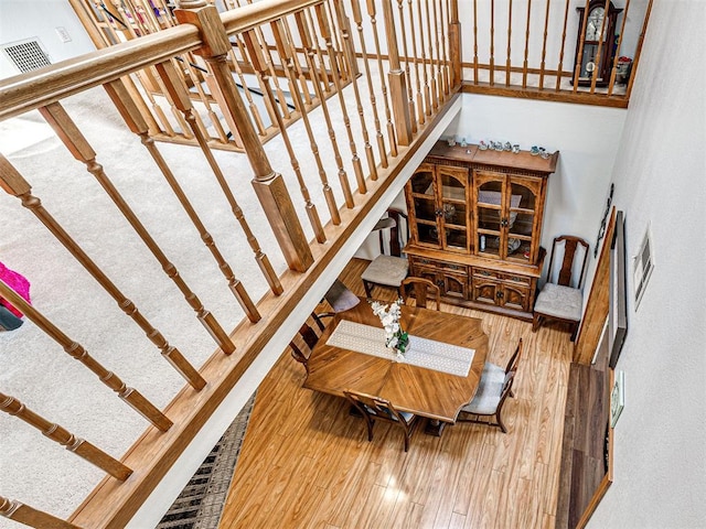 910860 S 3350th Rd, Wellston, OK 74881 - stairs with a high ceiling, visible vents, and hardwood / wood-style floors