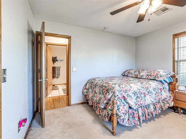 910860 S 3350th Rd, Wellston, OK 74881 - bedroom featuring carpet floors, a ceiling fan, and visible vents