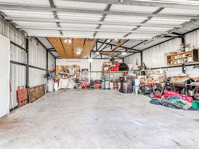 910860 S 3350th Rd, Wellston, OK 74881 - garage with metal wall and a workshop area