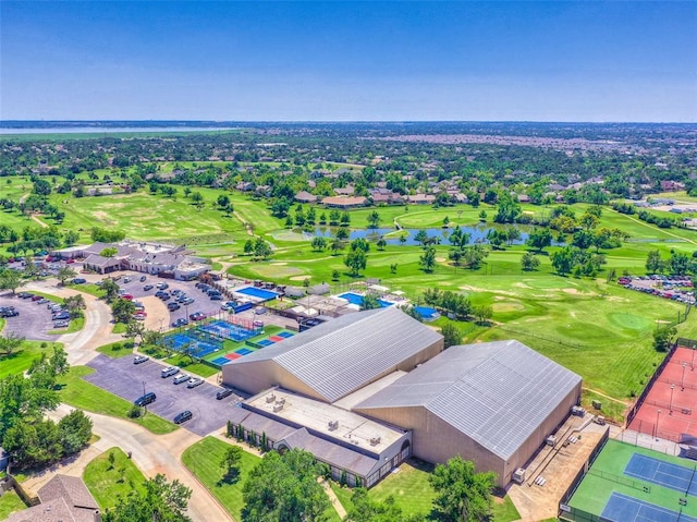 birds eye view of property featuring a water view, a residential view, and golf course view
