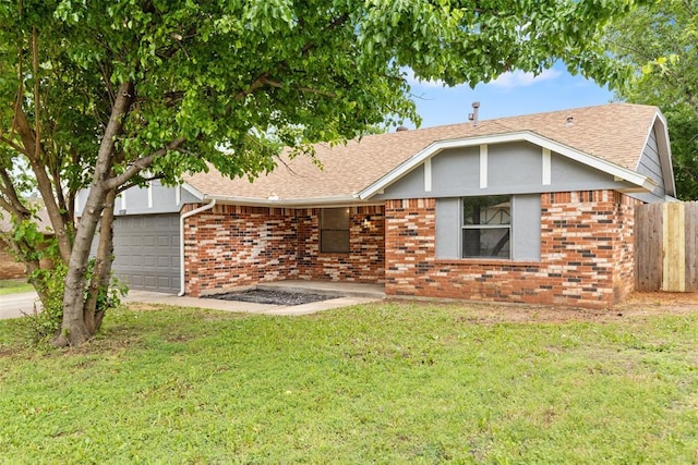 ranch-style house featuring fence, roof with shingles, an attached garage, brick siding, and a front yard
