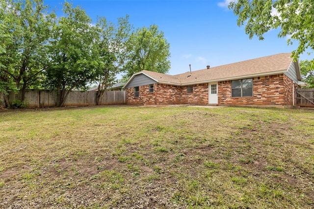 exterior space featuring a fenced backyard