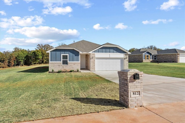 812 Stella Trl, Guthrie, OK 73044 - single story home with a garage, a front lawn, brick siding, board and batten siding, and concrete driveway