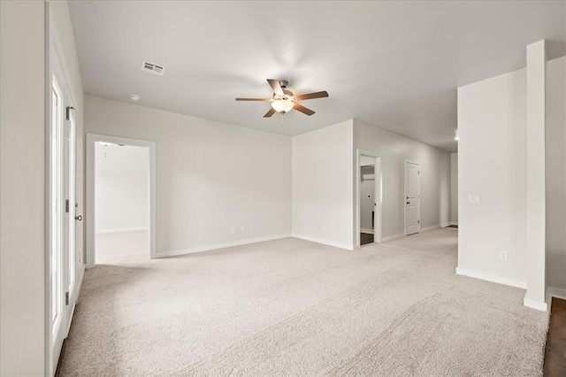812 Stella Trl, Guthrie, OK 73044 - spare room with carpet flooring, ceiling fan, visible vents, and baseboards