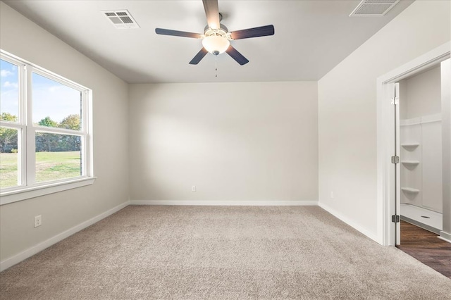 812 Stella Trl, Guthrie, OK 73044 - carpeted spare room with ceiling fan, visible vents, and baseboards