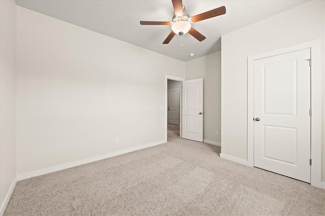 812 Stella Trl, Guthrie, OK 73044 - unfurnished bedroom featuring baseboards, ceiling fan, and carpet