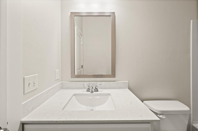 812 Stella Trl, Guthrie, OK 73044 - bathroom featuring vanity and toilet