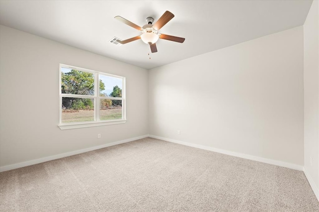 812 Stella Trl, Guthrie, OK 73044 - spare room with visible vents, a ceiling fan, baseboards, and carpet flooring