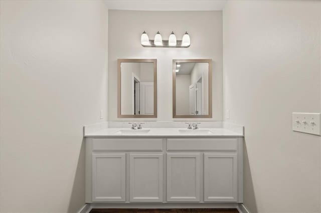 812 Stella Trl, Guthrie, OK 73044 - bathroom featuring double vanity and a sink