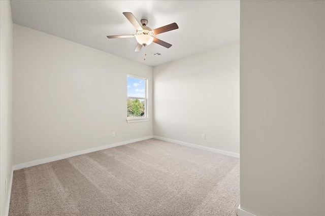 812 Stella Trl, Guthrie, OK 73044 - carpeted spare room featuring baseboards and ceiling fan