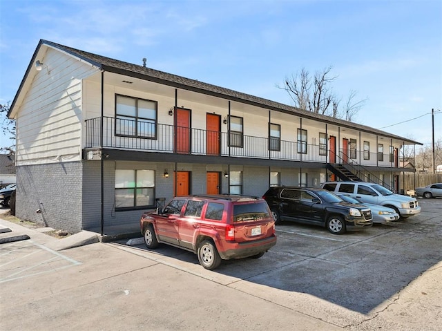 3509 N Nesbitt Ave, Oklahoma City, OK 73112 - view of building exterior with uncovered parking and stairway