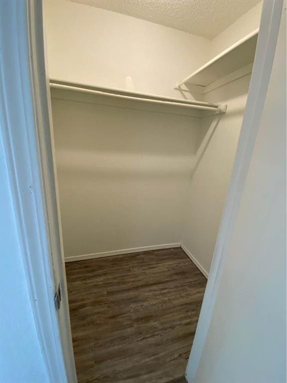 3509 N Nesbitt Ave, Oklahoma City, OK 73112 - walk in closet with dark wood finished floors
