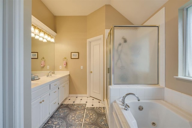 full bath with tile patterned flooring, double vanity, a whirlpool tub, a shower stall, and a sink