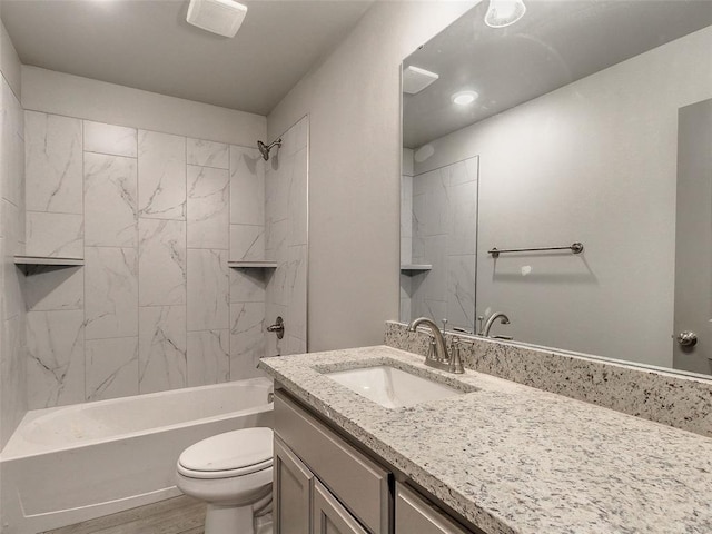 343787 E 870th Rd, Chandler, OK 74834 - bathroom with vanity, washtub / shower combination, wood finished floors, and toilet