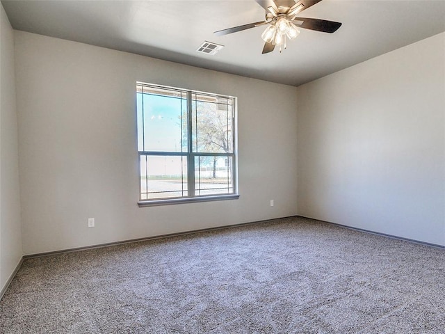 343787 E 870th Rd, Chandler, OK 74834 - carpeted spare room with a ceiling fan, baseboards, and visible vents