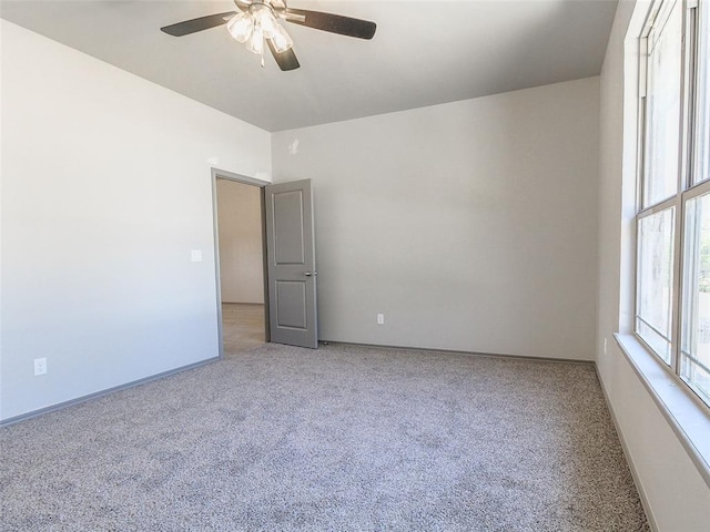 343787 E 870th Rd, Chandler, OK 74834 - spare room with carpet floors, ceiling fan, and baseboards