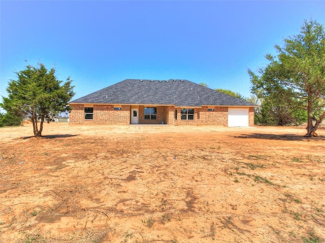 343787 E 870th Rd, Chandler, OK 74834 - back of house featuring an attached garage