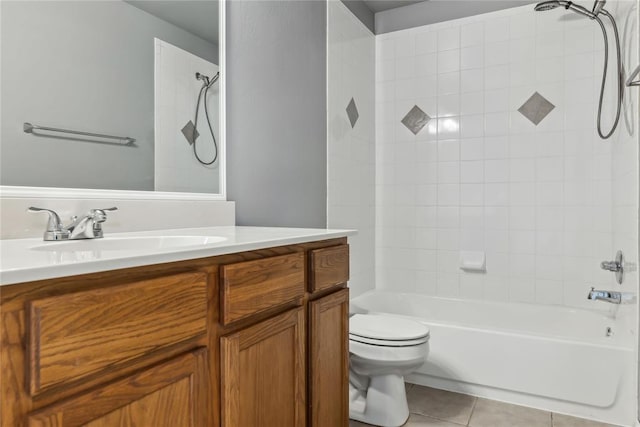 bathroom with shower / bath combination, tile patterned floors, toilet, and vanity