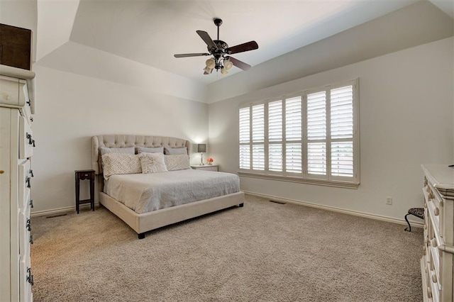 bedroom with baseboards, carpet flooring, and visible vents