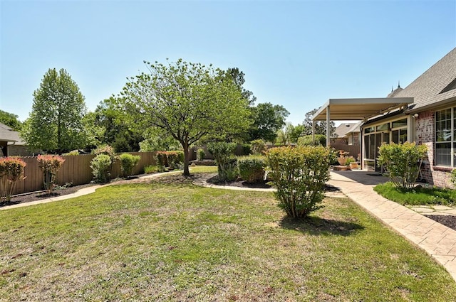 view of yard featuring fence