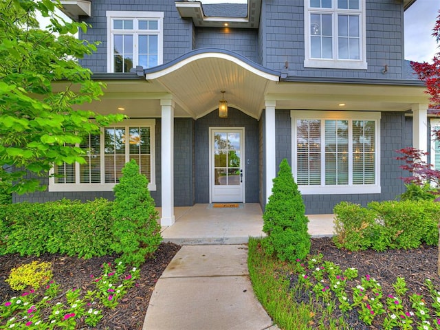 doorway to property featuring a porch