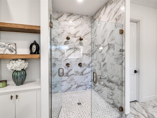 full bathroom with a marble finish shower and marble finish floor