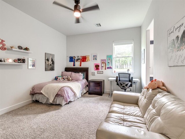 bedroom featuring visible vents, carpet flooring, baseboards, and ceiling fan