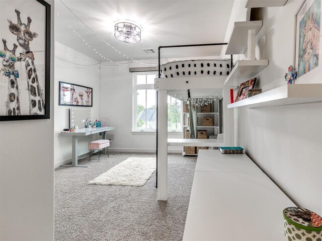 bedroom featuring baseboards, carpet flooring, and visible vents