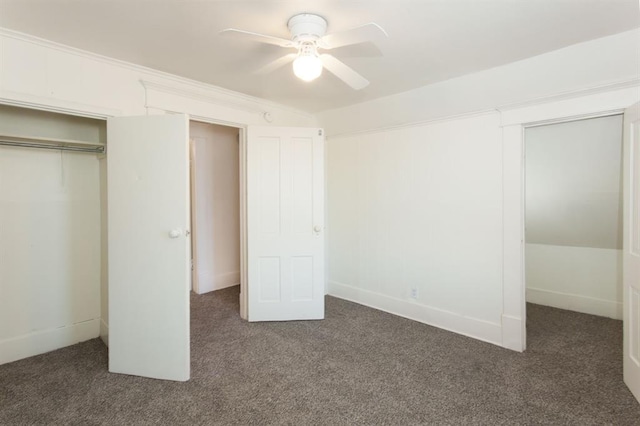unfurnished bedroom featuring a ceiling fan, baseboards, carpet, and a closet