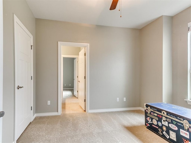 bedroom featuring baseboards, carpet, and ceiling fan