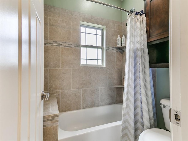 bathroom with toilet and shower / bathtub combination with curtain
